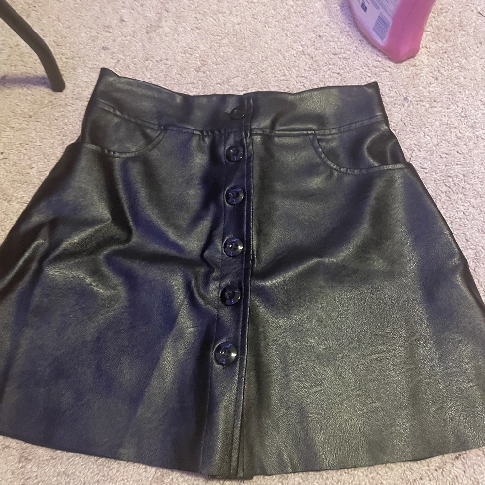 Super flattering and comfortable not real leather very breathable